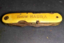 couteau multifonction pliant  ancien pradel  publicitaire rhum naura grog
