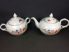 Ancienne théière et sucrier en porcelaine décor papillons et fleurs