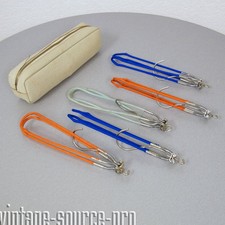 5 anciens cintres de voyage