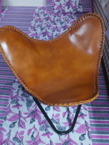 Pouf cuir papillon - en,