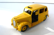 DINKY TOYS GB     AUSTIN TAXI  JAUNE   1/43 ème    REF 254   64/54     BON  ÉTAT