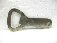 Ancien décapsuleur publicitaire " PERRIER " le champagne des eaux de table