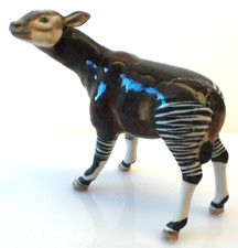 KLIMA Miniature statuette en