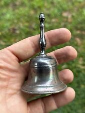 Petite sonnette de table en