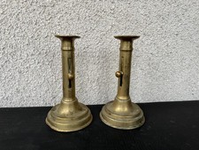 Paire de bougeoir poussoir en