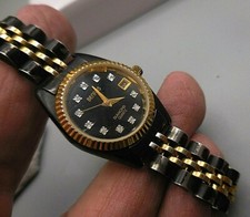 BENRUS DIAMON MONTRE VINTAGE QUARTZ A DATE DE 1970 FONCTIONNELLE(pièces-restaur)