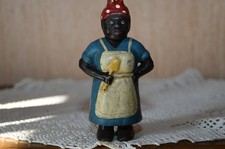 TIRELIRE EN FONTE PEINTE : PERSONNAGE AMÉRICAIN " CUISINIERE "  - H : 14 cm