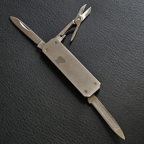Petit couteau suisse pliant