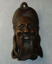 Ancien masque mural en