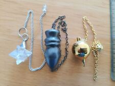 lot de 3 pendules ,)égyptien hématite , merkaba cristal de roche, solune doré