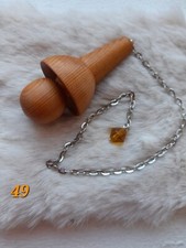 Pendule en bois de if