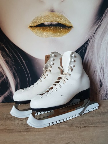 Paire patins glace blanc - de,