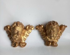 sculptures paire angelots putti en bois sculpté doré à la feuille d'or