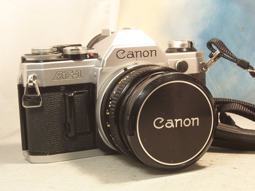 Canon avec objectif - ,