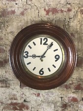 Horloge murale en bois et