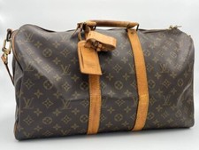 Sac louis vuitton keepall 45 avec bandoulière en bon état générale (marron)