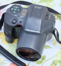 Olympus boîtier argentique en mauvais état avec zoom 28-110 vendu pour pièces