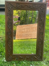 Miroir en bois sculpté style