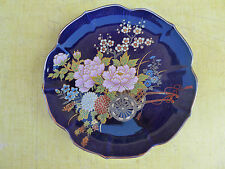 Ancienne petite assiette bleu nuit à décor de charette de fleur  art populaire 