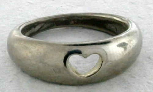 Silver tone ring with - with, center