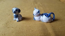 Très bel ensemble chien et chat en porcelaine