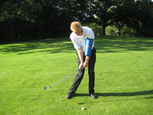 Golf bending your - your, arm,