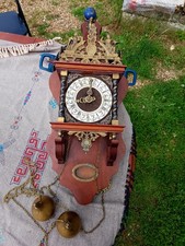 horloge murale ancienne vintage en bois à poids et balancier