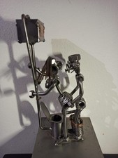 Dérouleur et figurine scène