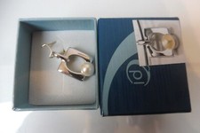 Pendentif Pierre Lang, Très