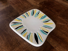 JOLI DESSOUS DE PLAT EN