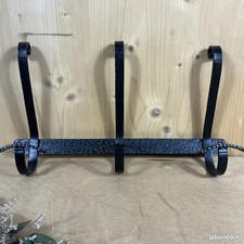 Black wrought iron coat Rack
