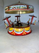 ANCIEN JOUET MECANIQUE MANEGE DE MARQUE JOUSTRA EN TOLE