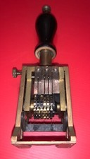 Ancien tampon numéroteur en laiton Trouillet passage Gambetta Paris XXe