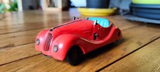 Ancienne voiture mécanique SCHUCO EXAMICO 4001 couleur rouge à compléter.
