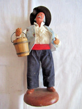 ANCIEN SANTON homme au seau