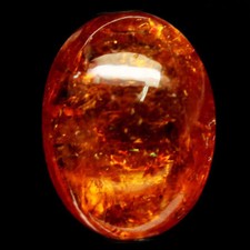 Grenat mandarin orange intense en cabocon ovale de 8,35Cts