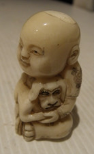 Sculpture japonaise détaillée en netsuke personnage et son chien 5 cm TBE 28 g