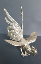 Coq de combat en métal ailes déployées