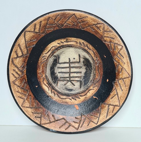 Assiette décorative terre