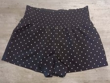 short court noir à pois blanc