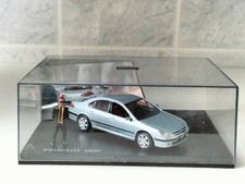 Peugeot 607 dans boîte vitrine. Norev 1/43 ⚠️ personnage recollé 
