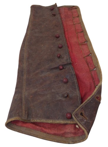 Une guêtre cuir marron - en,