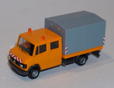 HERPA Mercedes-Benz L307D double cabine orange plateau  baché HO 1/87