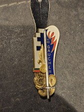 Pucelle Insigne promo Ecole