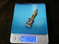 bronze doré en réduction