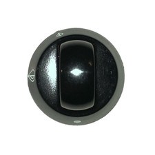 Plaque de cuisson à bouton