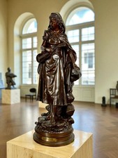 SCULPTURE / FEMME A LA