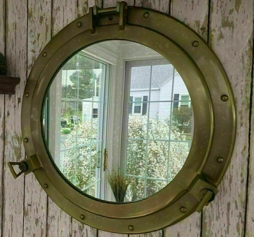 Grande cabine miroir hublot