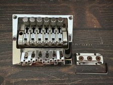 Pont trémolo type Kahler chromé sans logo modèle inconnu avec écrou de verrou...