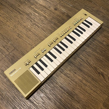 Clavier électronique YAMAHA PS-300 PortaSound 37 touches 8 tons 10 rythmes DC9V